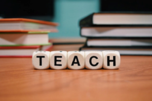 Teachers Can Make Thousands - cubes spelling out Teach. - Are You Passionate and Dedicated Educators?