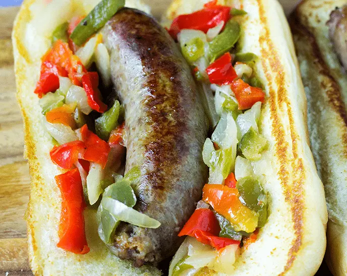 Instant Post & More - Instant Pot Wine Brats this is a variation of my personal recipe of Instant Pot Wine Brats with bell peppers and onions on a tortilla.