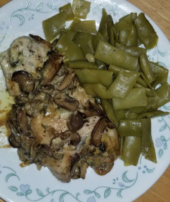 Tamis Stuffed Pocket Recipe - Chicken Thigh stuffed with mushrooms, onions, cheeses, then baked. Served with a side of Italian Style Green Beans.